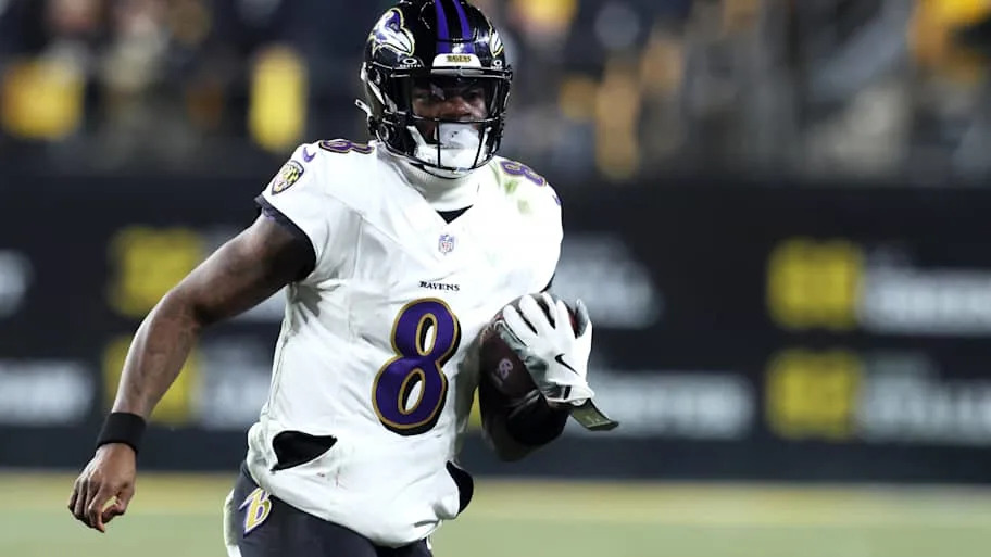 Jackson rushes the ball against the Pittsburgh Steelers during the first half at Acrisure Stadium.