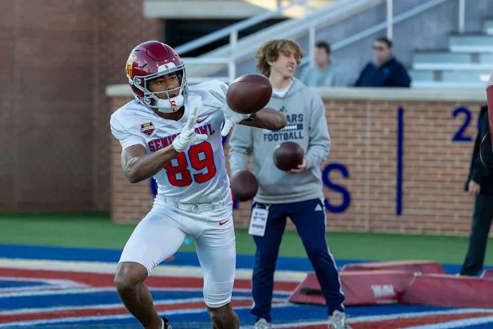 Jan 28, 2026; Mobile, AL, USA; American Team wide receiver Ja'kobi Lane (89) of USC works in passing drills during American Senior Bowl practice at Hancock Whitney Stadium. Mandatory Credit: Vasha Hunt-Imagn Images