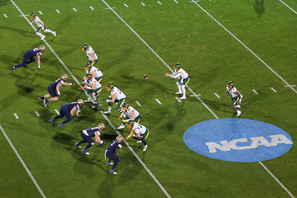 Cam Miller #7 of the North Dakota State Bison snaps the ball against the Montana State Bobcats during the Division I FCS Football Championship held at Toyota Stadium on January 6, 2025