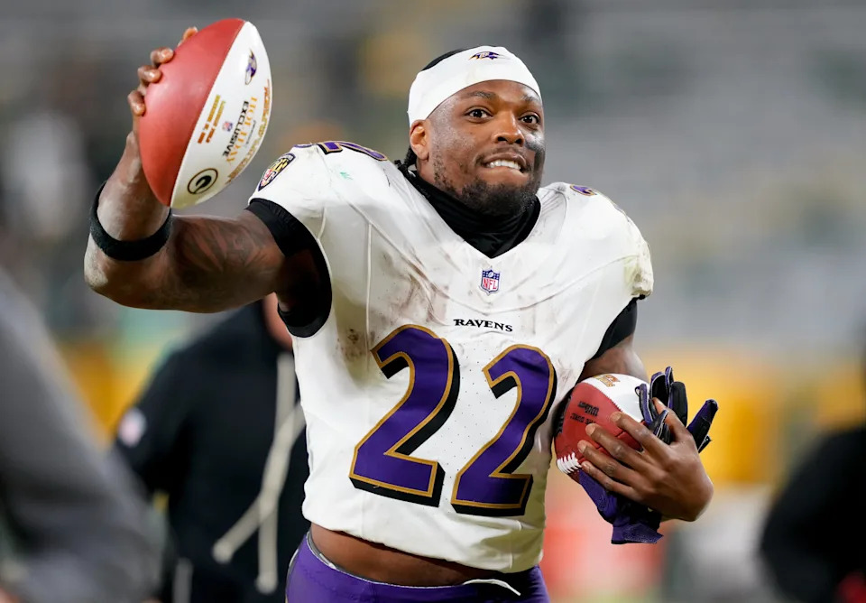 Dec 27, 2025; Green Bay, Wisconsin, USA; Baltimore Ravens running back Derrick Henry (22) celebrates after the game against the Green Bay Packers at Lambeau Field. Mandatory Credit: Kayla Wolf-Imagn Images