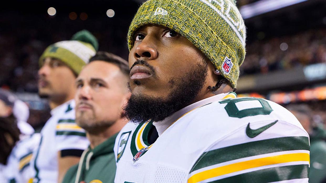 <div>CHICAGO, ILLINOIS - JANUARY 10: Josh Jacobs #8 of the Green Bay Packers stands for the National Anthem prior to an NFL wild card playoff football game against the Chicago Bears at Solider Field on January 10, 2026 in Chicago, Illinois. (Photo by Todd Rosenberg/Getty Images)</div>