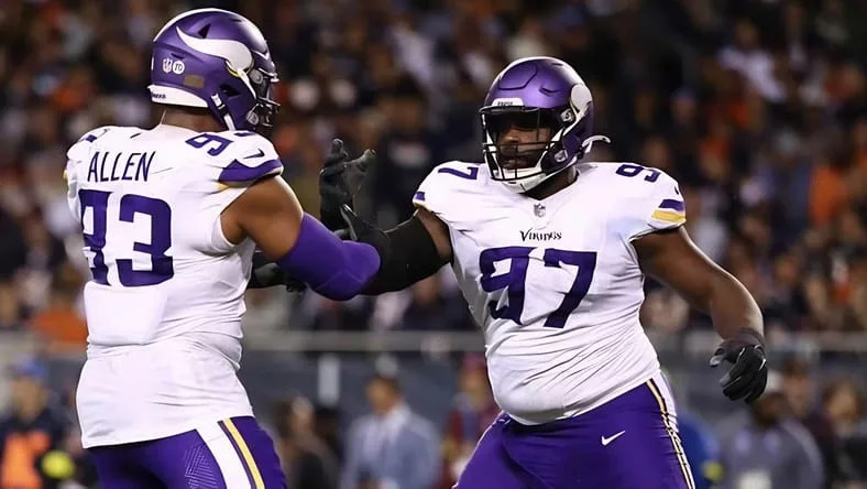 Vikings DTs Jonathan Allen and Javon Hargrave celebrate in Week 1 of 2025