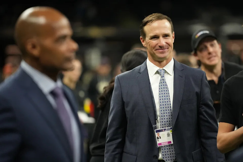 Nov 23, 2025; New Orleans, Louisiana, USA; Former New Orleans Saint quarterback Drew Brees on the field prior to a game against the Atlanta Falcons at Caesars Superdome. Mandatory Credit: Matthew Hinton-Imagn Images© Matthew Hinton-Imagn Images&period;