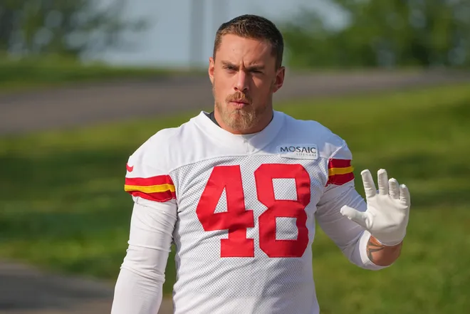 Jul 22, 2024; St. Joseph, MO, USA; Kansas City Chiefs linebacker Cole Christiansen (48) walks down the hill from the locker room to the fields prior to training camp at Missouri Western State University. Mandatory Credit: Denny Medley-USA TODAY Sports
