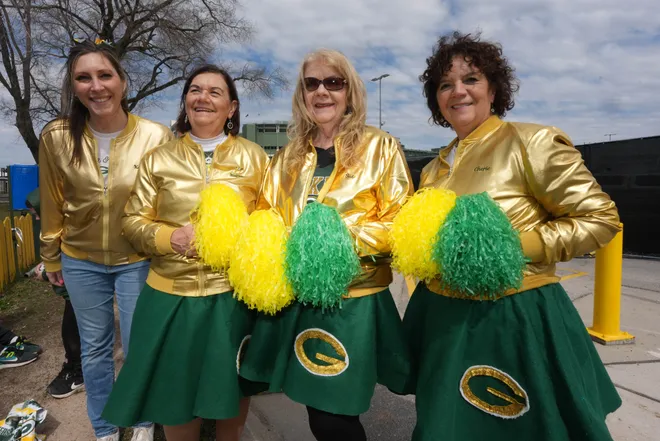 Apr 24, 2025; Green Bay, WI, USA; Green Bay Packers female fans dressed as cheerleaders pose during the NFL Draft at Lambeau Field. Mandatory Credit: Kirby Lee-Imagn Images