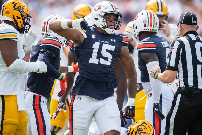 Auburn Tigers defensive lineman Keldric Faulk (15) celebrates a stop as Auburn Tigers take on California Golden Bears at Jordan-Hare Stadium in Auburn, Ala., on Saturday, Sept. 7, 2024.