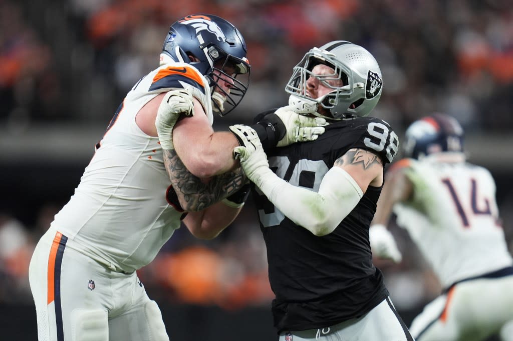 Denver Broncos offensive tackle Garett Bolles, left, blocks Las Vegas Raiders defensive end Maxx Crosby during the second half of an NFL football game in Las Vegas, Sunday, Dec. 7, 2025. (AP Photo/Gregory Bull) AP