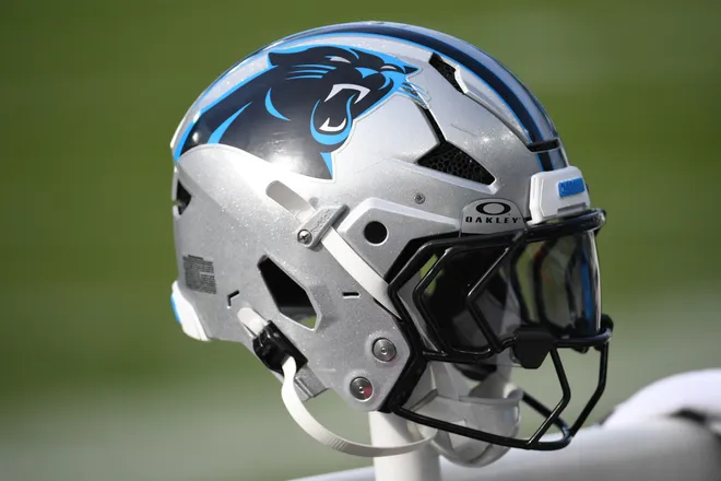 Carolina Panthers helmet rests on the bench
