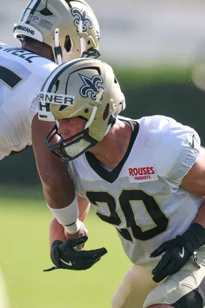 Jul 28, 2025; Metairie, LA, USA; New Orleans Saints linebacker Pete Werner (20) on ball drills during training camp at Ochsner Sports Performance Center. Mandatory Credit: Stephen Lew-Imagn Images