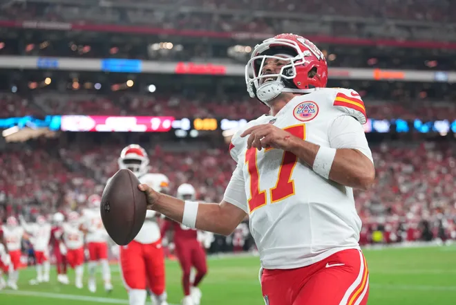 Aug 9, 2025; Glendale, Arizona, USA; Kansas City Chiefs quarterback Gardner Minshew (17) celebrates a touchdown against the Arizona Cardinals during the first half at State Farm Stadium. Mandatory Credit: Joe Camporeale-Imagn Images