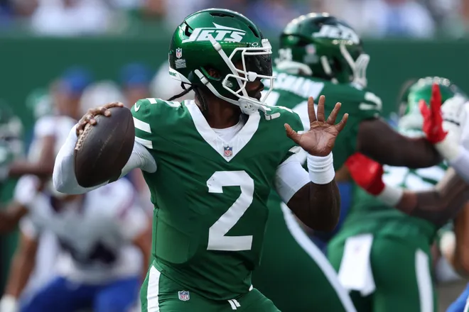 Sep 14, 2025; East Rutherford, New Jersey, USA; New York Jets quarterback Tyrod Taylor (2) drops back to pass against the Buffalo Bills during the second half at MetLife Stadium. Mandatory Credit: Vincent Carchietta-Imagn Images
