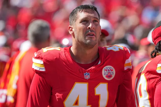 Aug 17, 2024; Kansas City, Missouri, USA; KKansas City Chiefs long snapper James Winchester (41) watches a replay against the Detroit Lions during the game at GEHA Field at Arrowhead Stadium. Mandatory Credit: Denny Medley-USA TODAY Sports