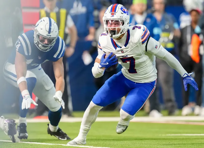 Buffalo Bills cornerback Taron Johnson (7) rushes for a touchdown after intercepting the first pass of the game by Indianapolis Colts quarterback Joe Flacco (15) on Sunday, Nov. 10, 2024, during a game at Lucas Oil Stadium in Indianapolis.
