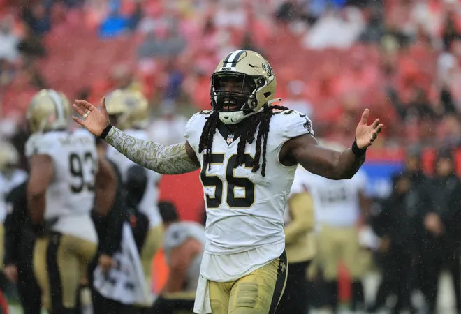 Dec 7, 2025; Tampa, Florida, USA; New Orleans Saints linebacker Demario Davis (56) reacts after a tackle during the second quarter against the Tampa Bay Buccaneers at Raymond James Stadium. Mandatory Credit: Kim Klement Neitzel-Imagn Images