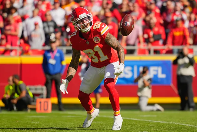Oct 19, 2025; Kansas City, Missouri, USA; Kansas City Chiefs wide receiver Nikko Remigio (81) catches a punt against the Las Vegas Raiders during the second quarter of the game at GEHA Field at Arrowhead Stadium. Mandatory Credit: Jay Biggerstaff-Imagn Images
