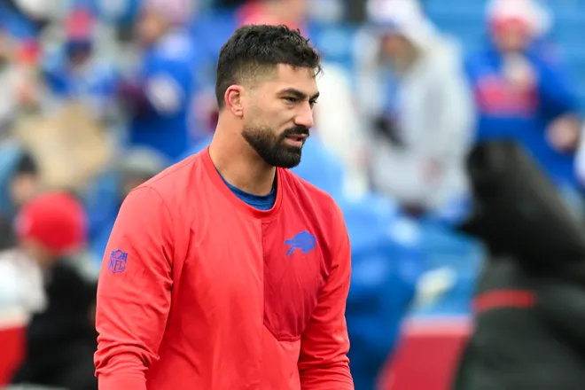 Nov 16, 2025; Orchard Park, New York, USA; Buffalo Bills defensive end AJ Epenesa (57) warms up prior to the game at Highmark Stadium. Mandatory Credit: Mark Konezny-Imagn Images