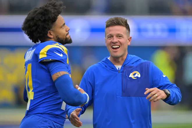 Sep 28, 2025; Inglewood, California, USA; Los Angeles Rams cornerback Cobie Durant (14) and offensive coordinator Mike LaFleur as they get ready for the game against the Indianapolis Colts at SoFi Stadium. Mandatory Credit: Jayne Kamin-Oncea-Imagn Images