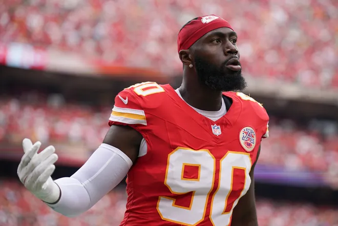 Sep 14, 2025; Kansas City, Missouri, USA; Kansas City Chiefs defensive end Charles Omenihu (90) looks on prior to the game against the Philadelphia Eagles at GEHA Field at Arrowhead Stadium. Mandatory Credit: Denny Medley-Imagn Images