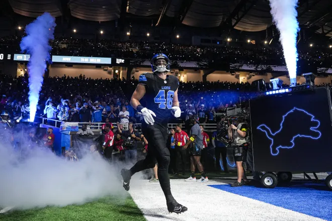 Detroit Lions linebacker Jack Campbell (46) runs onto the field for first half against Tampa Bay Buccaneers at Ford Field in Detroit on Monday, Oct. 20, 2025.