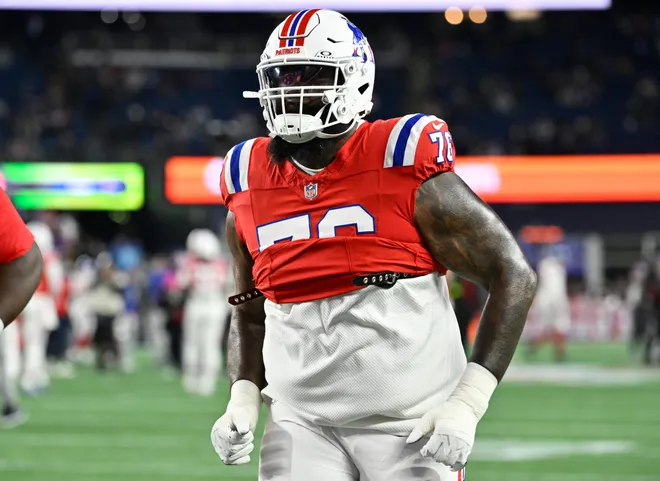 Dec 1, 2025; Foxborough, Massachusetts, USA; New England Patriots offensive tackle Morgan Moses (76) warms up prior to the game against the New York Giants at Gillette Stadium.