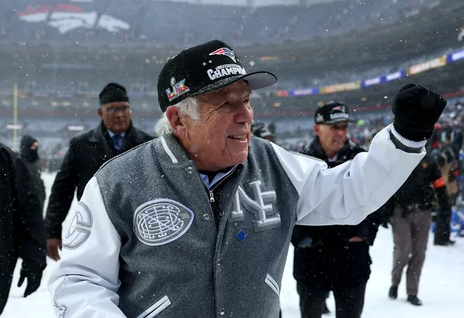Owner Robert Kraft of the New England Patriots interacts with the crowd.