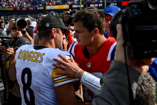 Pittsburgh Steelers quarterback Aaron Rodgers and New England Patriots quarterback Drake Maye after the game at Gillette Stadium.