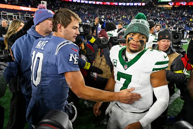 New England Patriots quarterback Drake Maye and New York Jets quarterback Justin Fields react after the game at Gillette Stadium.