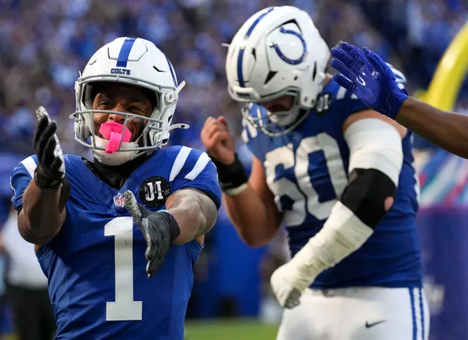Indianapolis Colts wide receiver Josh Downs (1) celebrates after scoring a touchdown against the Arizona Cardinals during a game on Sunday, Oct. 12, 2025, at Lucas Oil Stadium in Indianapolis. The Colts defeated the Cardinals 31-27.