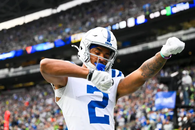 Dec 14, 2025; Seattle, Washington, USA; Indianapolis Colts wide receiver Josh Downs (2) celebrates after catching a touchdown pass against the Seattle Seahawks during the second quarter at Lumen Field. Mandatory Credit: Steven Bisig-Imagn Images