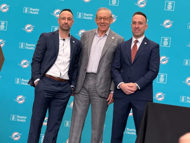 Miami Dolphins owner Stephen Ross (center) introduces new general manager Jon-Eric Sullivan (left) and coach Jeff Hafley on Jan. 22, 2026.