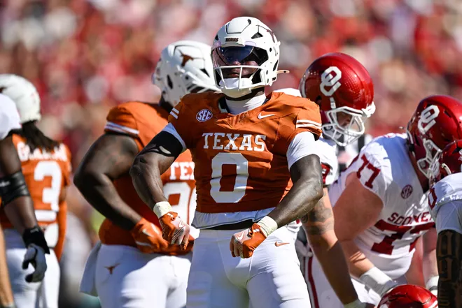 Oct 11, 2025; Dallas, Texas, USA; Texas Longhorns linebacker Anthony Hill Jr. (0) celebrates during the game between the Texas Longhorns and the Oklahoma Sooners at the Cotton Bowl. Mandatory Credit: Jerome Miron-Imagn Images