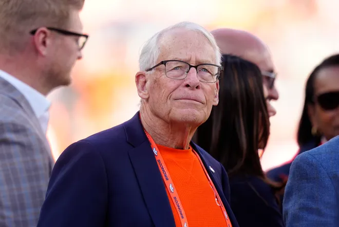 Denver Broncos owner Rob Walton stands on the sidelines prior to a game against the Green Bay Packers at Empower Field at Mile High.