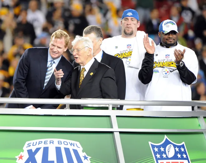 NFL commissioner Roger Goodell (left) talks with Pittsburgh Steelers owner Dan Rooney (second from left), president Art Rooney (center), quarterback Ben Roethlisberger (second from right) and coach Mike Tomlin.