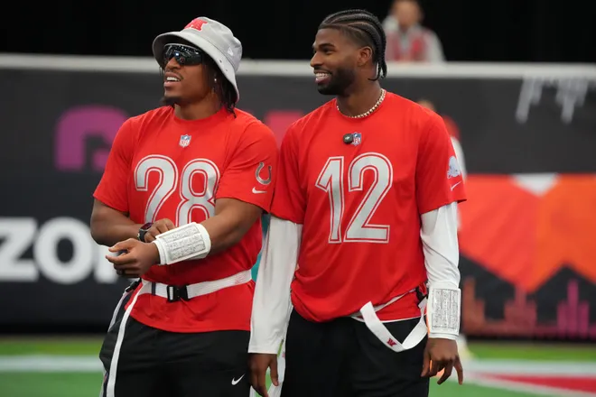 Feb 1, 2026; San Francisco, CA, USA; Indianapolis Colts running back Jonathan Taylor (28) and Cleveland Browns quarterback Shadeur Sanders (12) during AFC practice at the Flag Fieldhouse Moscone Center South Building. Mandatory Credit: Kirby Lee-Imagn Images