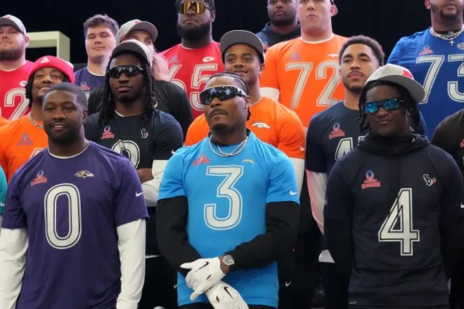 Feb 1, 2026; San Francisco, CA, USA; Baltimore Ravens linebacker Roquan Smith (0), Los Angeles Chargers safety Derwin James (3) and Houston Texans cornerback 
Kamari Lassiter (4) pose during AFC practice at the Flag Fieldhouse Moscone Center South Building. Mandatory Credit: Kirby Lee-Imagn Images