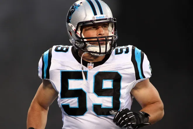 Aug 17, 2012; Charlotte, NC, USA; Carolina Panthers linebacker Luke Kuechly (59) runs out of the tunnel before the start of the game against the Miami Dolphins at Bank of America Stadium. The Panthers defeated the Dolphins 23-17. Mandatory Credit: Jeremy Brevard-USA TODAY Sports