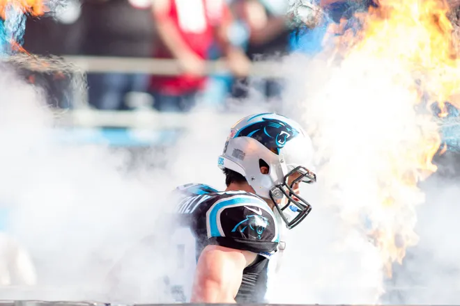 Dec 13, 2015; Charlotte, NC, USA; Carolina Panthers middle linebacker Luke Kuechly (59) runs onto the field prior to the game against the Atlanta Falcons at Bank of America Stadium. Panthers defeated the Falcons 38-0. Mandatory Credit: Jeremy Brevard-USA TODAY Sports