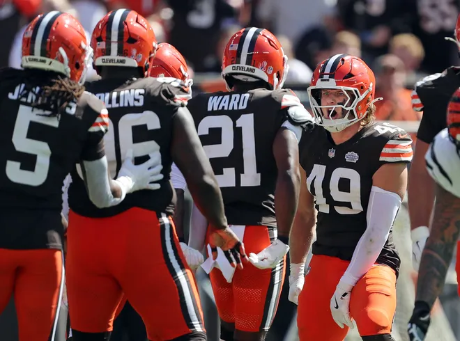Cleveland Browns linebacker Carson Schwesinger (49) celebrates after making a stop during the second half of an NFL football game at Huntington Bank Field, Sept. 7, 2025, in Cleveland, Ohio.