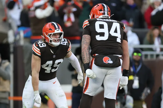 Dec 21, 2025; Cleveland, Ohio, USA; Cleveland Browns linebacker Carson Schwesinger (49) reacts with defensive tackle Mason Graham (94) after a sack against the Buffalo Bills during the second half at Huntington Bank Field. Mandatory Credit: Scott Galvin-Imagn Images