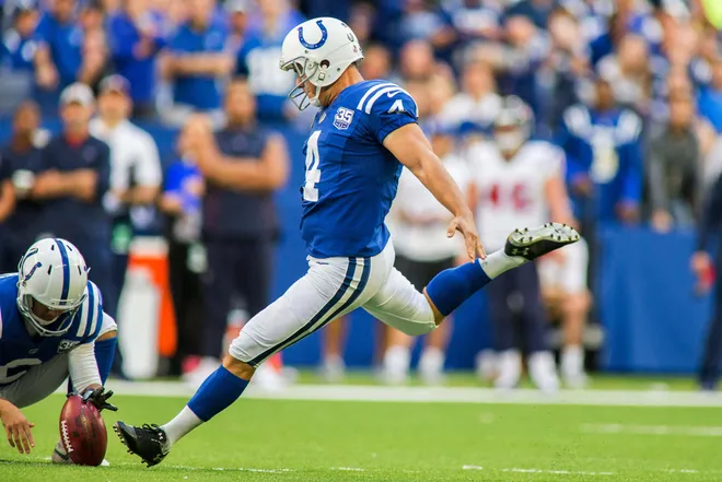 Sep 30, 2018; Indianapolis, IN, USA; Indianapolis Colts kicker Adam Vinatieri (4) kicks the ball becoming the all time leader in made field goals in the game against the Houston Texans at Lucas Oil Stadium. Mandatory Credit: Trevor Ruszkowski-USA TODAY Sports
