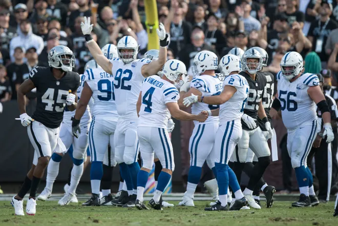 October 28, 2018; Oakland, CA, USA; Indianapolis Colts kicker Adam Vinatieri (4) is congratulated for kicking a field goal to become NFL's all-time points leader during the second quarter against the Oakland Raiders at Oakland Coliseum. Mandatory Credit: Kyle Terada-USA TODAY Sports