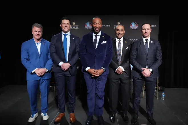 Feb 5, 2026; San Franciso, CA, USA; From left: Adam Vinatieri, Luke Kuechly, Larry Fitzgerald, Roger Craig and Drew Brees pose during a press conference introducing the NFL Hall of Fame Class of 2026 at Palace of Fine Arts. Mandatory Credit: Kirby Lee-Imagn Images