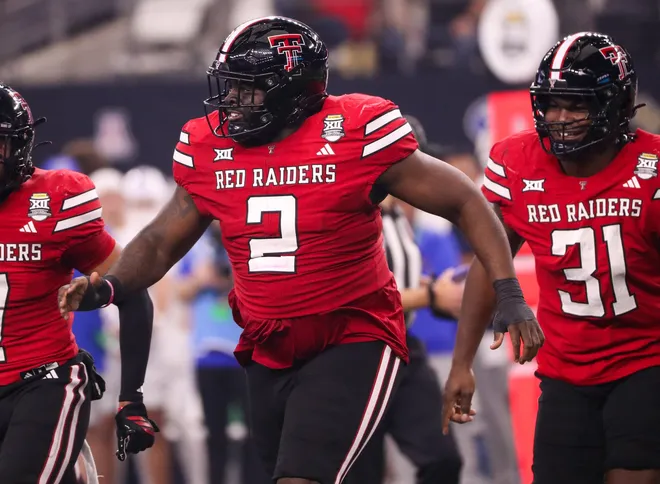 Texas Tech's Lee Hunter runs to the sideline after making a tackle against BYU during the Big 12 Conference championship football game, Saturday, Nov. 6, 2025, at AT&T Stadium in Arlington.