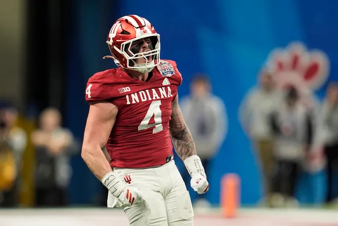 Jan 9, 2026; Atlanta, GA, USA; Indiana Hoosiers linebacker Aiden Fisher (4) reacts after a defensive stop against the Oregon Ducks during the third quarter of the 2025 Peach Bowl and semifinal game of the College Football Playoff at Mercedes-Benz Stadium. Mandatory Credit: Dale Zanine-Imagn Images