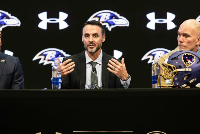 Jesse Minter and Eric DeCosta at press conference at Under Armour Performance Center.