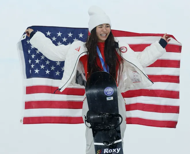 Chloe Kim of the United States celebrates her silver medal.