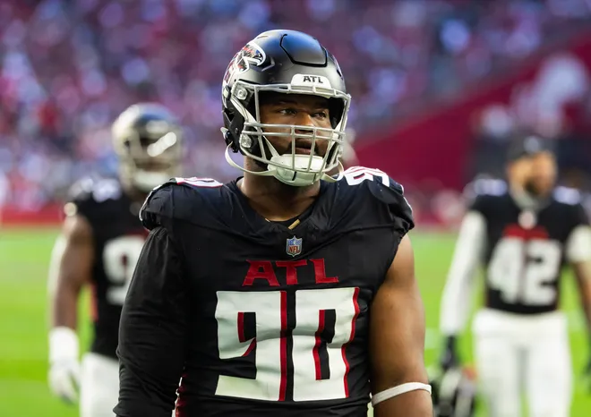 Dec 21, 2025; Glendale, Arizona, USA; Atlanta Falcons defensive lineman David Onyemata (90) against the Arizona Cardinals at State Farm Stadium. Mandatory Credit: Mark J. Rebilas-Imagn Images