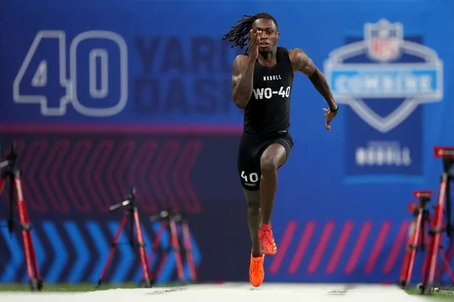 Texas wide receiver Xavier Worthy ran an official time of 4.21 seconds to set a combine record.