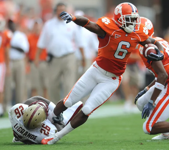 Clemson wide receiver Jacoby Ford is brought down by Boston College linebacker Dominick LeGrande.