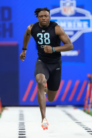Tariq Woolen #DB38 of UTSA runs the 40 yard dash during the NFL Combine at Lucas Oil Stadium on March 6, 2022.